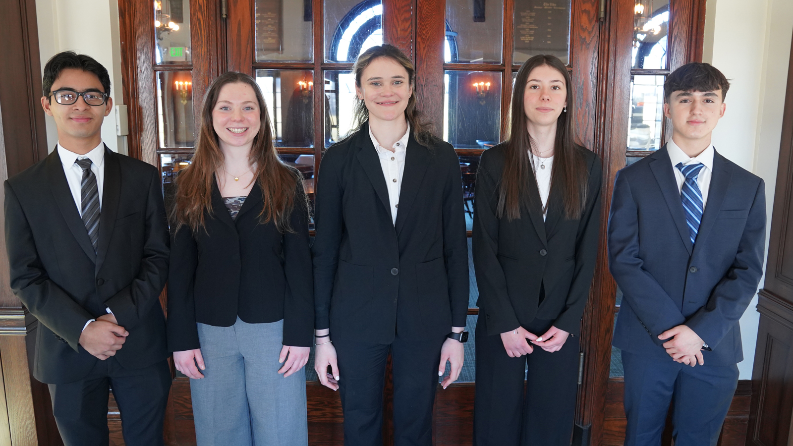 Five student caddies from Connecticut